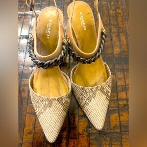 Coach. SZ 8, excellent condition sling back w/decorative metallic chain.